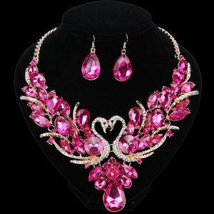 A PINK CRYSTFAL SWAN NECKLACEAND EARRINGS